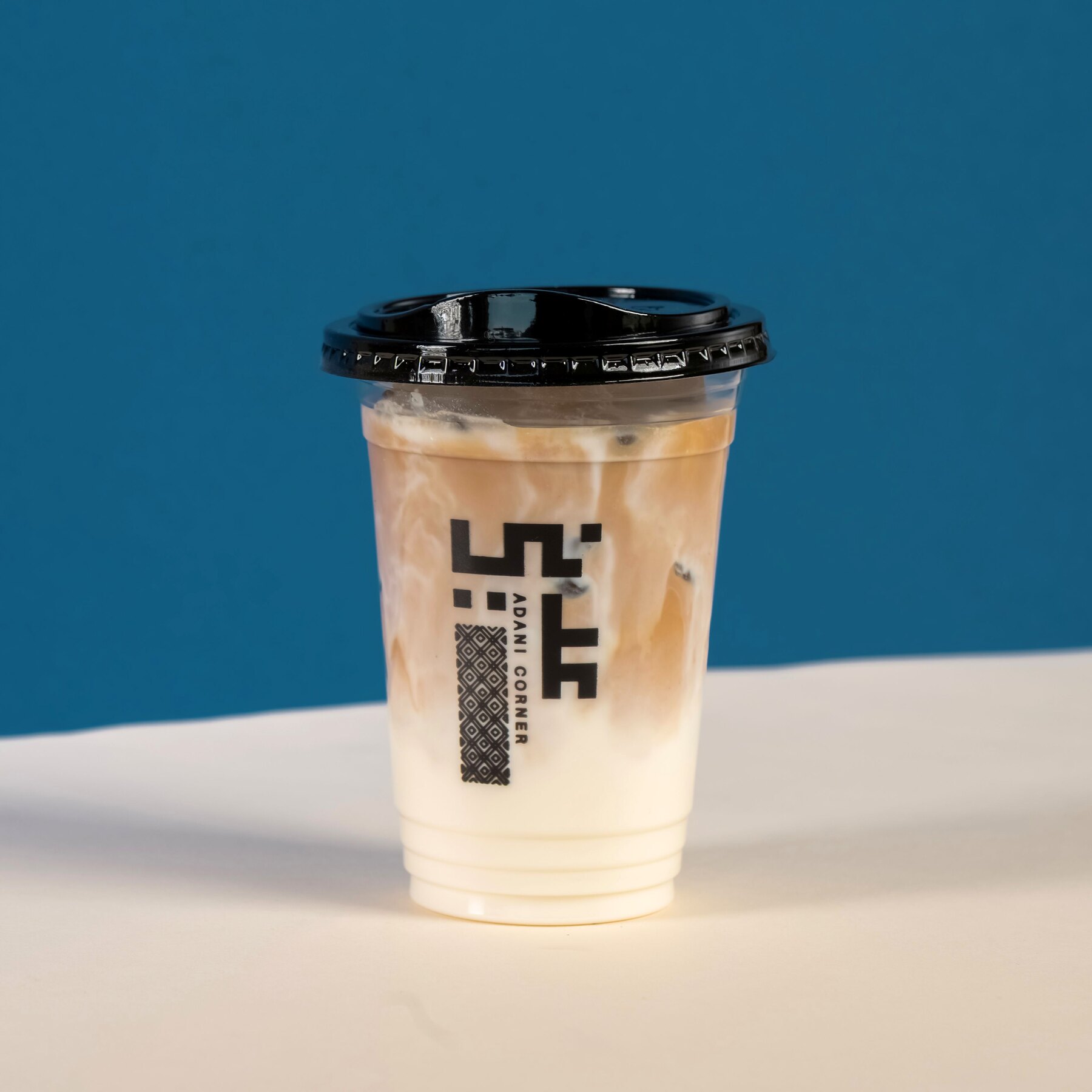 Iced Tahini Latte in an Adani Corner cup